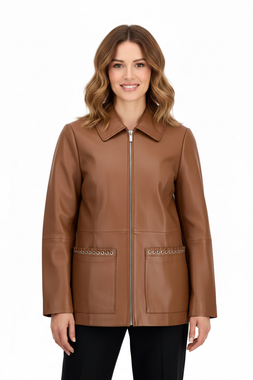A woman modeling a brown real lambskin leather jacket with a silver front zipper and decorative silver chain accents on the front pockets, set against a plain light gray background.