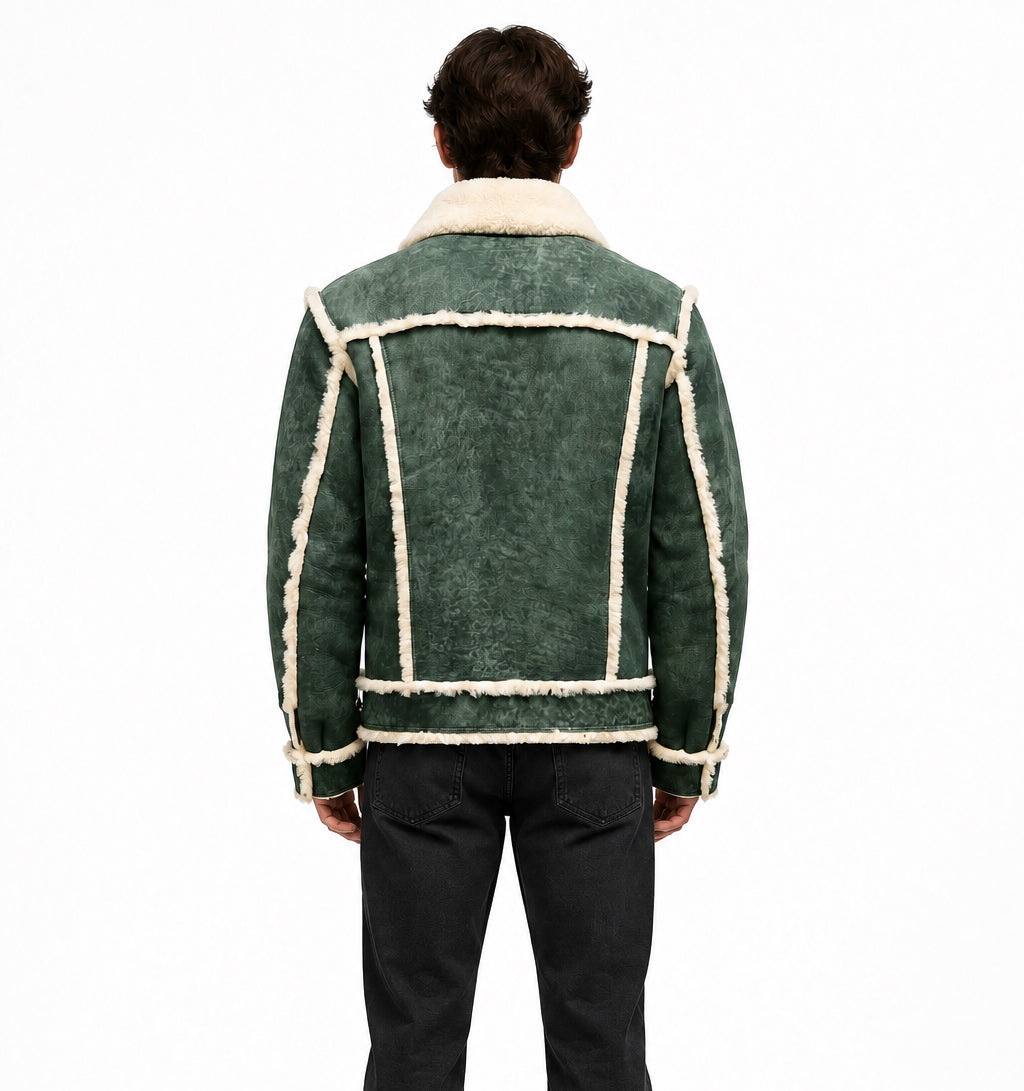 A dark green shearling jacket with white fringed trim and a white sherpa collar,