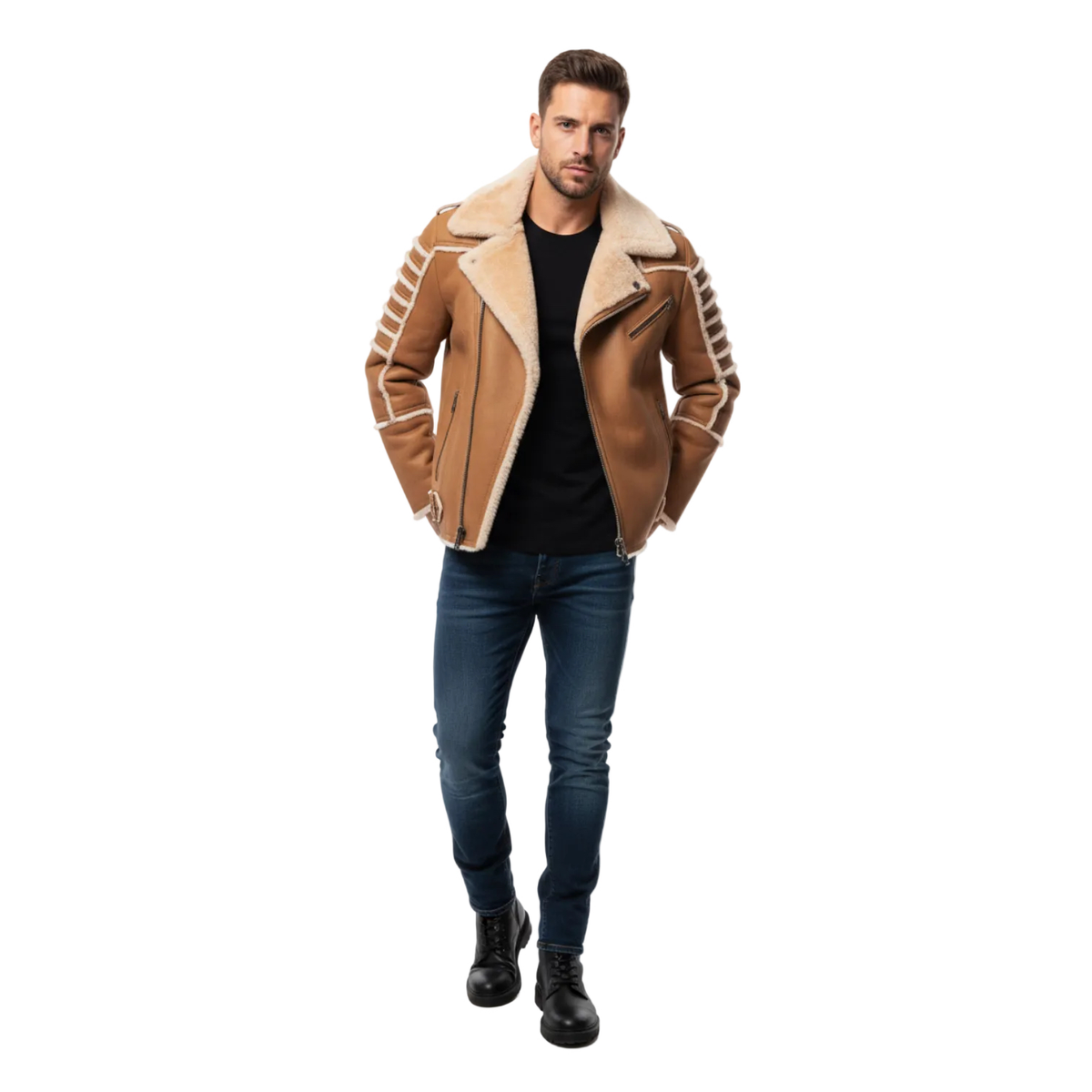 A man modeling a tan shearling-lined aviator-style jacket with white stripe details on the sleeves, worn over a black t-shirt, blue jeans, and black boots against a white studio background.