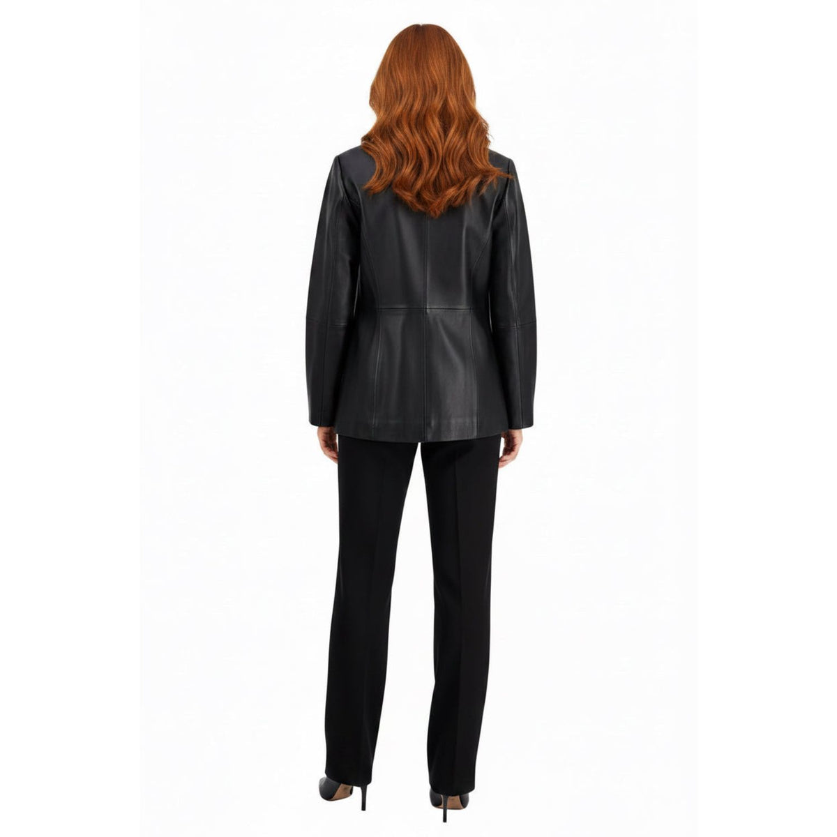 A woman shown from the back wearing a black structured leather jacket and black trousers against a light gray studio background.