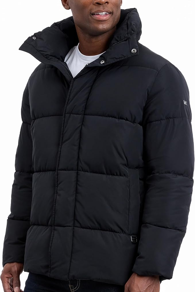 Man wearing a black puffer jacket on a white background